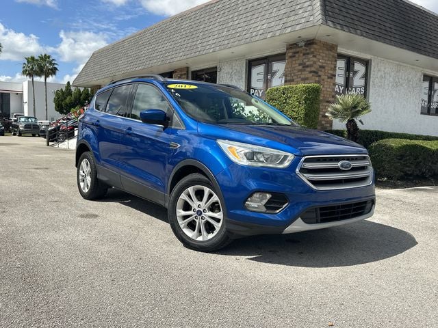 2017 Ford Escape SE in Lightning Blue Metallic — front three-quarter view
