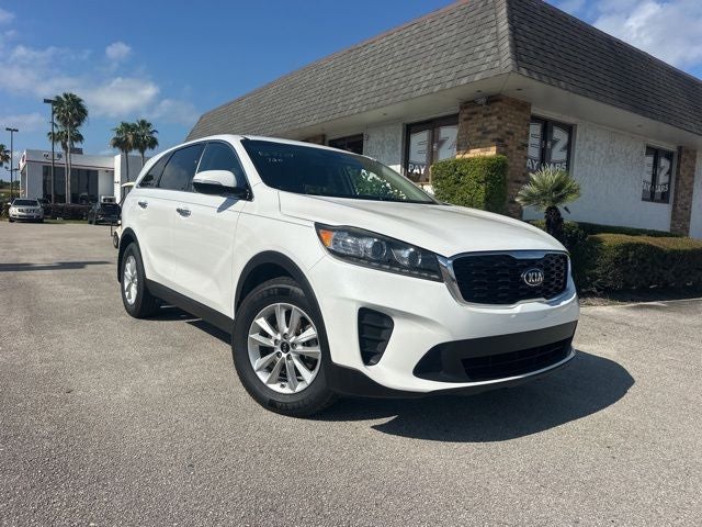 2019 Kia Sorento LX in Snow White Pearl — front three-quarter view