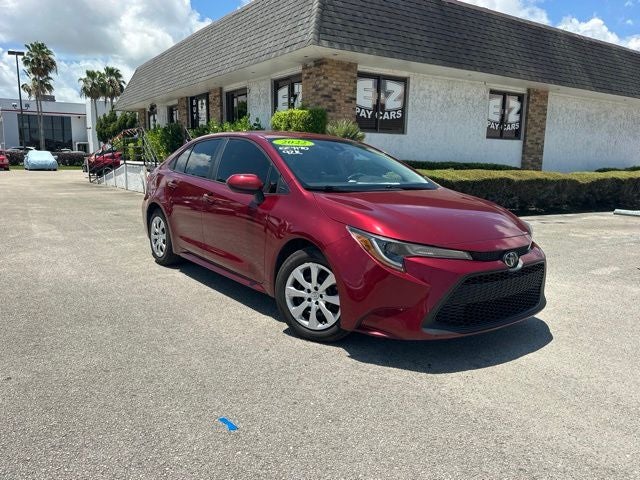 2022 Toyota Corolla LE in Pearl — front three-quarter view
